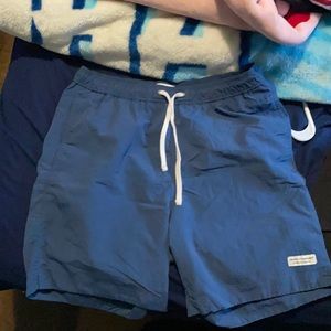 Blue swim shorts.
